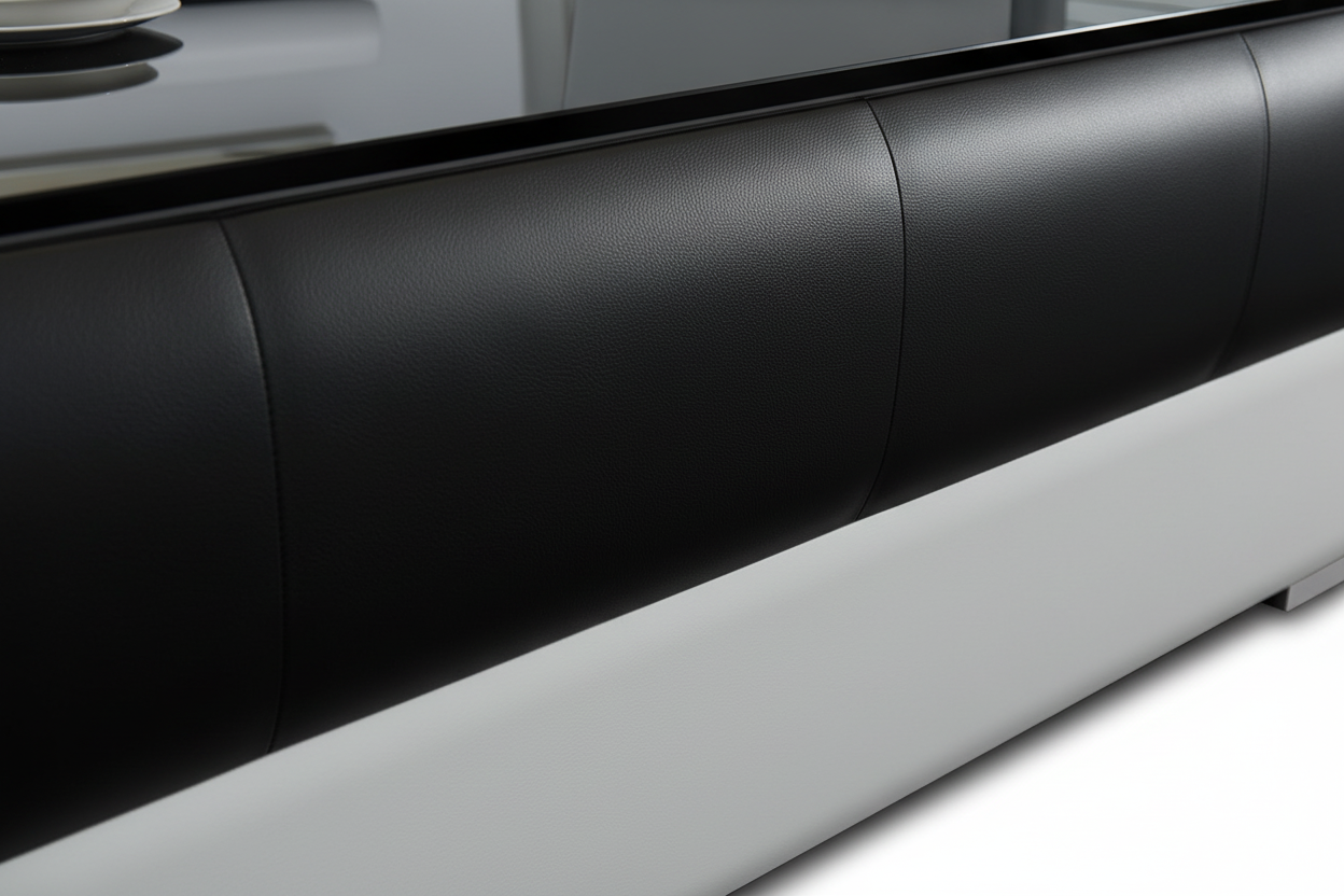 Aqui Coffee Table - Black Leather & Base Transition Detail