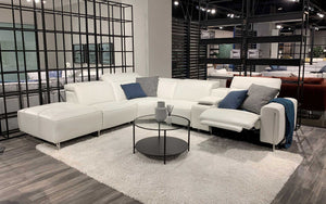 VOYAGE MODERN LEATHER SECTIONAL WITH OTTOMAN